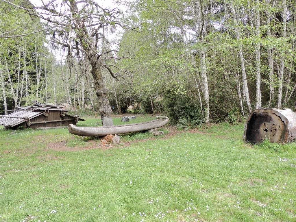 Dressing house & canoe in Sumeg Village