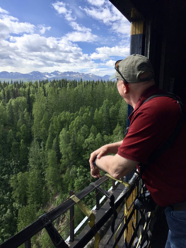 Watching for wildlife in the baggage car