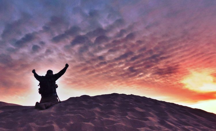 A full-time RVer marvels at sunset at Imperial Dunes near Winterhaven, CA, January 2018