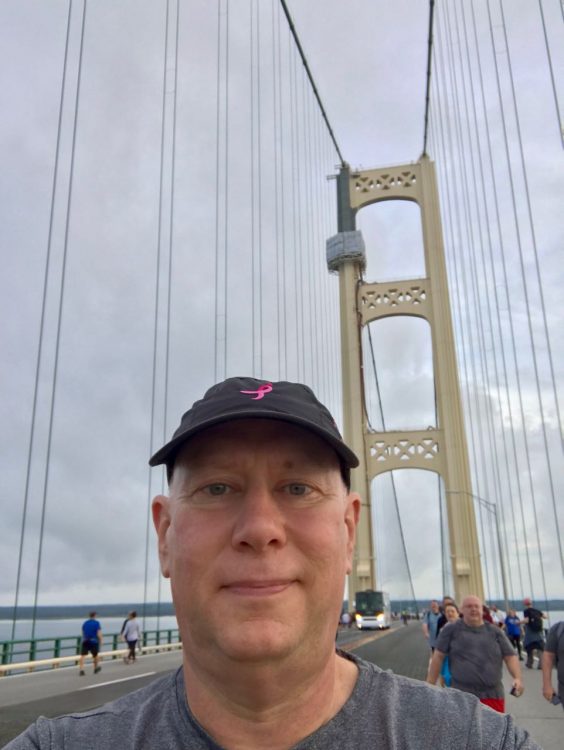 Between the north tower and mid-span