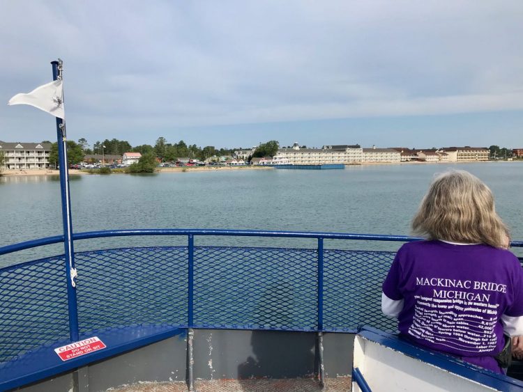 The ferry pulls out of the Mackinaw City dock.