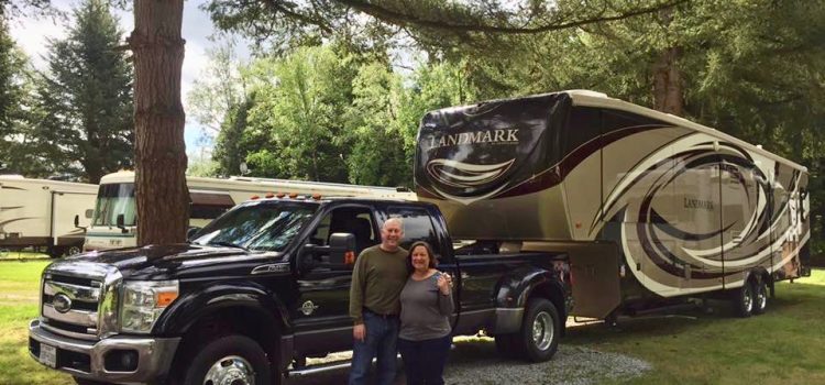 9 Truths We Discovered in Our First Year of Full-Time RV Living Cheryl & David with rig in Blaine, WA